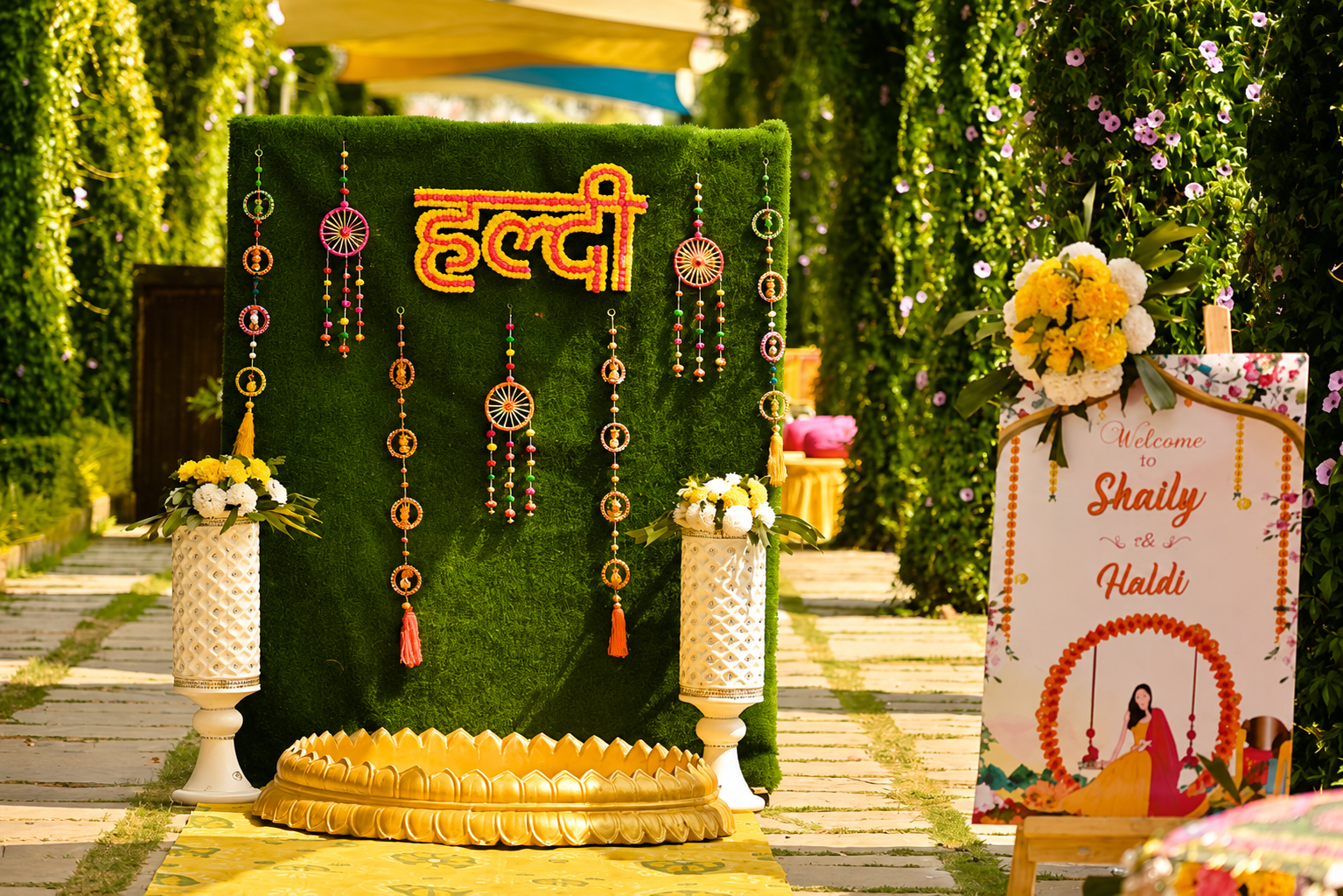 Haldi ceremony backdrop with marigold Haldi sign and tassels